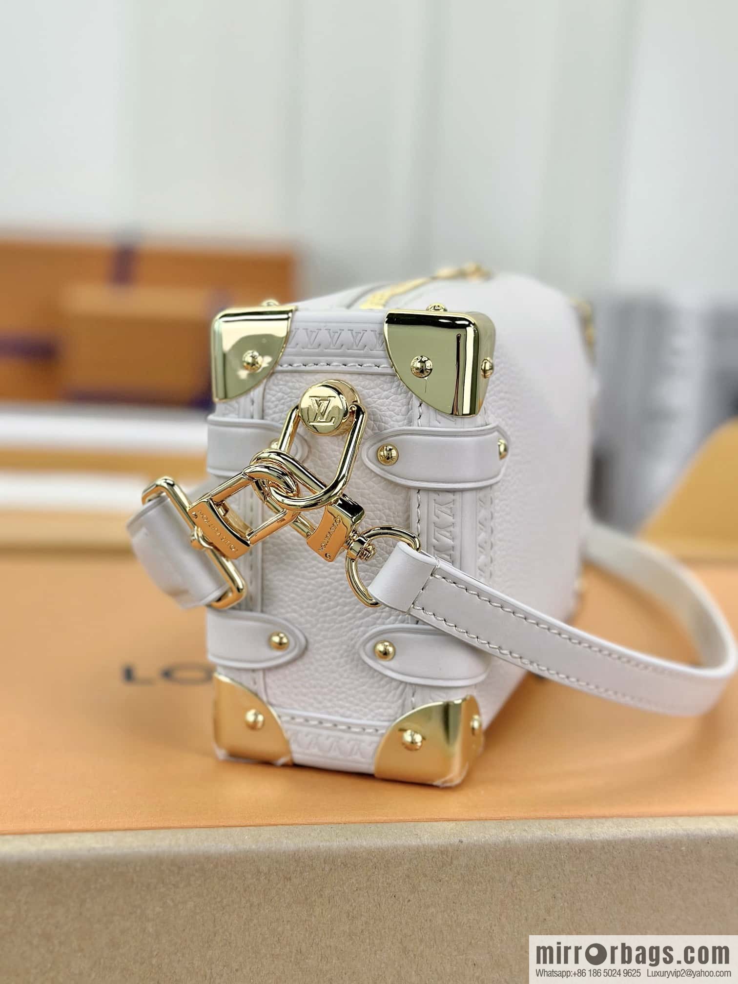 LV M23915 SIDE TRUNK small handbag