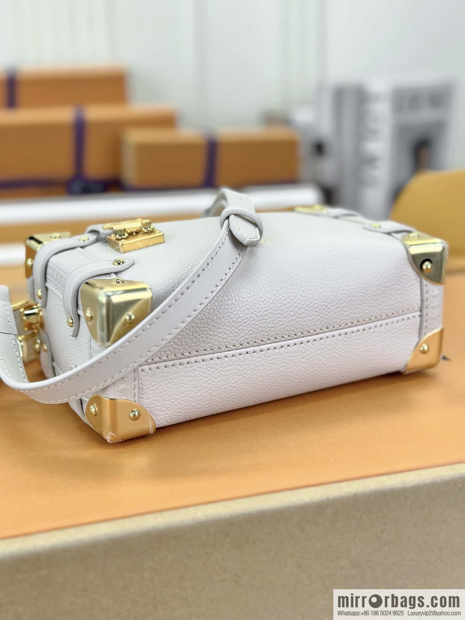 LV M23915 SIDE TRUNK small handbag