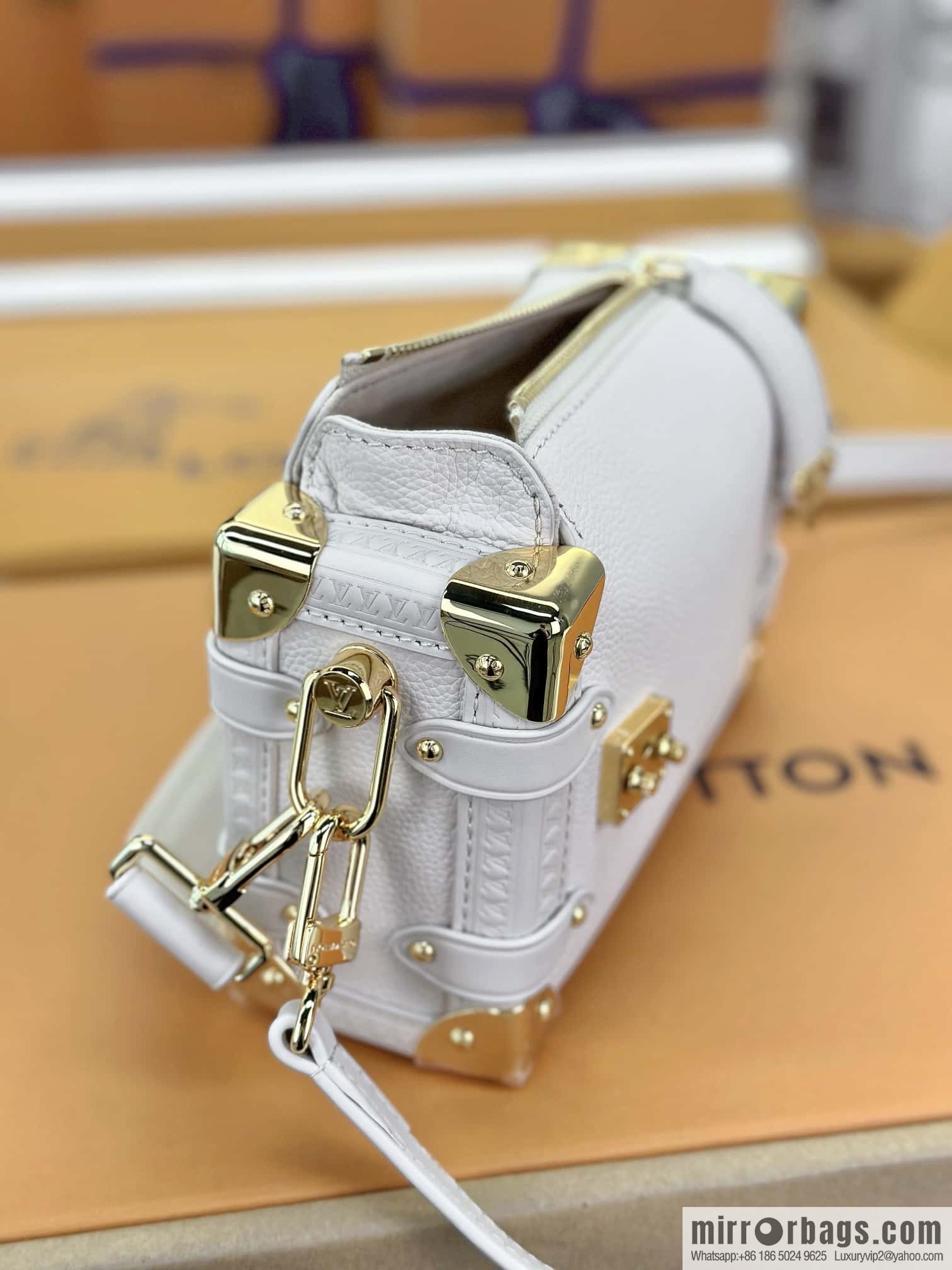 LV M23915 SIDE TRUNK small handbag
