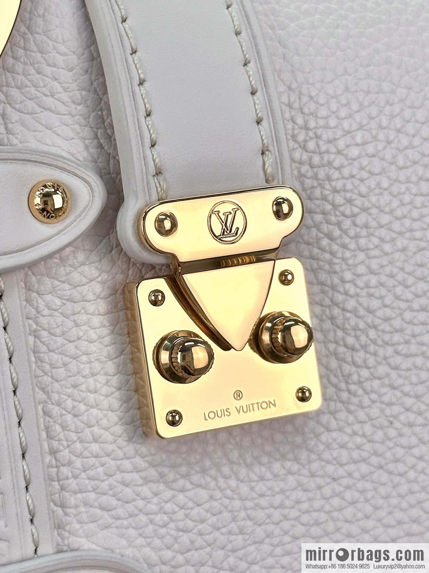 LV M23915 SIDE TRUNK small handbag
