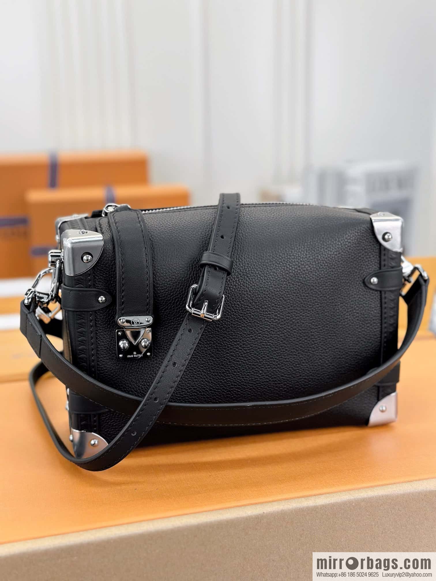 LV M25160 SIDE TRUNK medium handbag