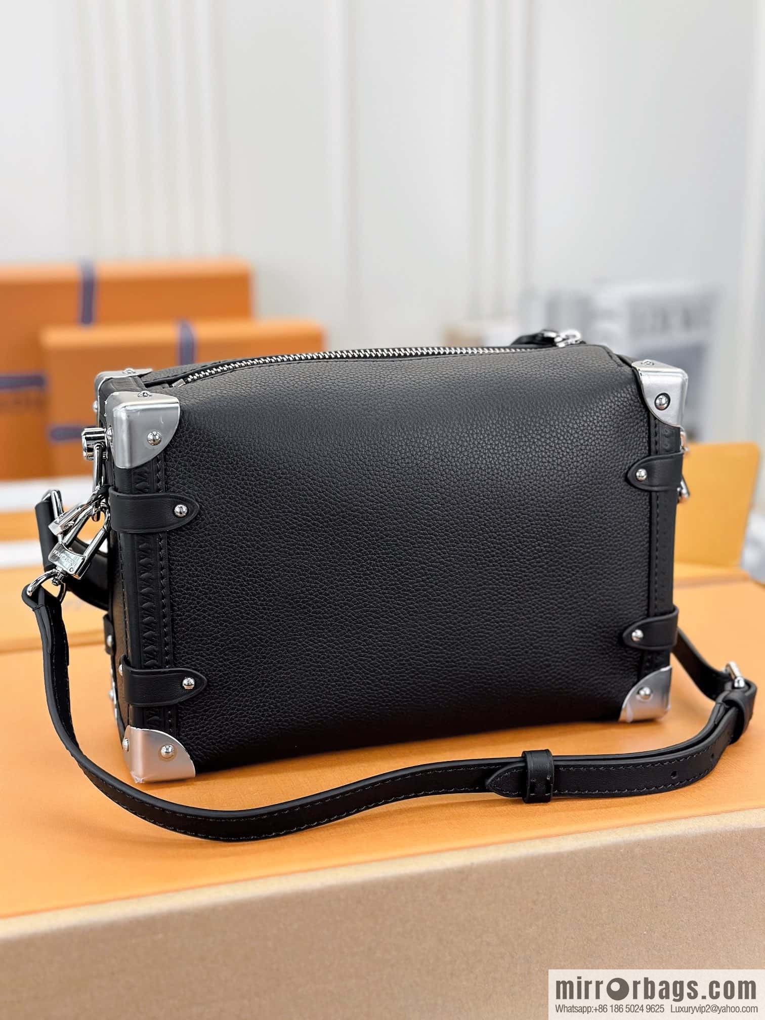 LV M25160 SIDE TRUNK medium handbag