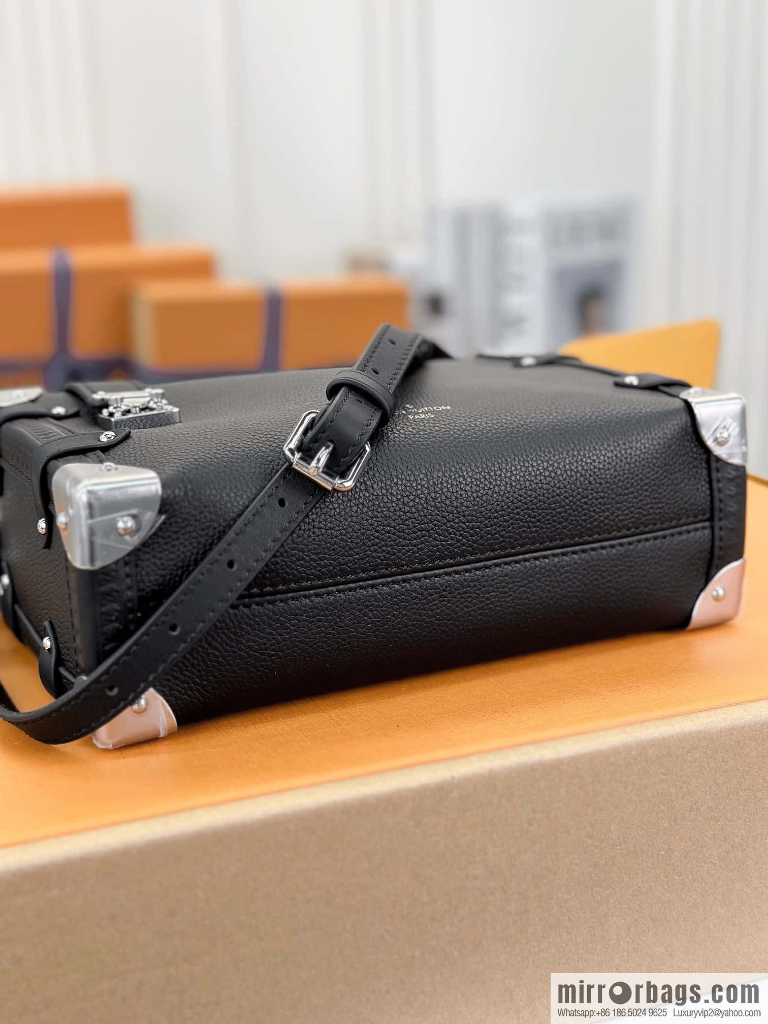 LV M25160 SIDE TRUNK medium handbag