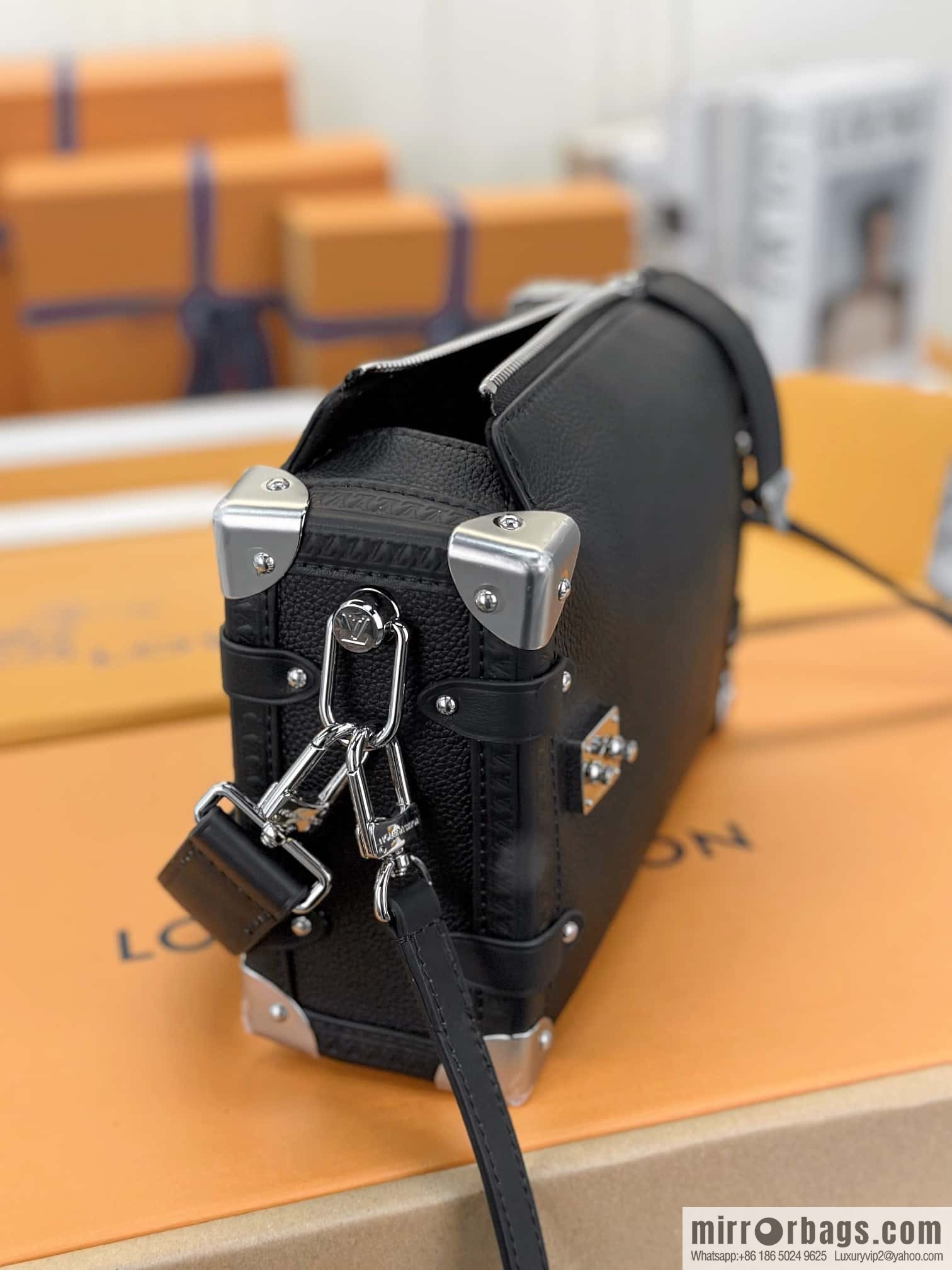 LV M25160 SIDE TRUNK medium handbag