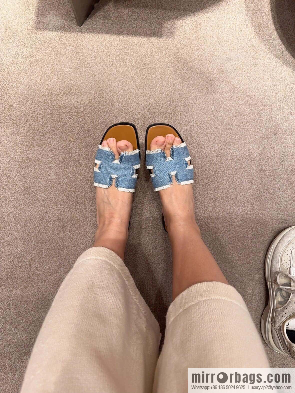 The latest denim tassel slippers from Hermès