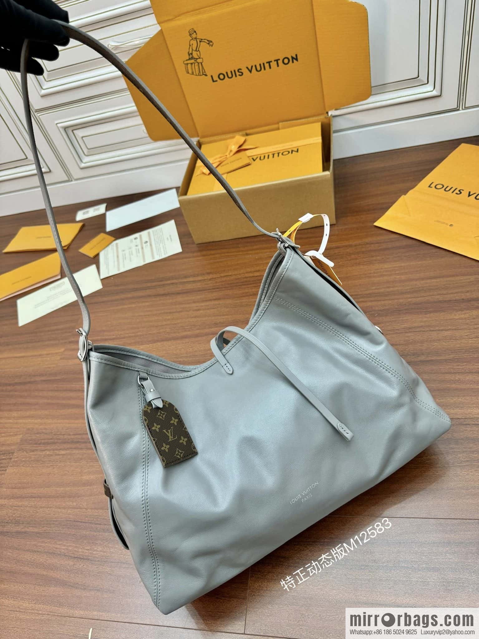LV M12583 new CARRYALL DARK medium handbag of the season