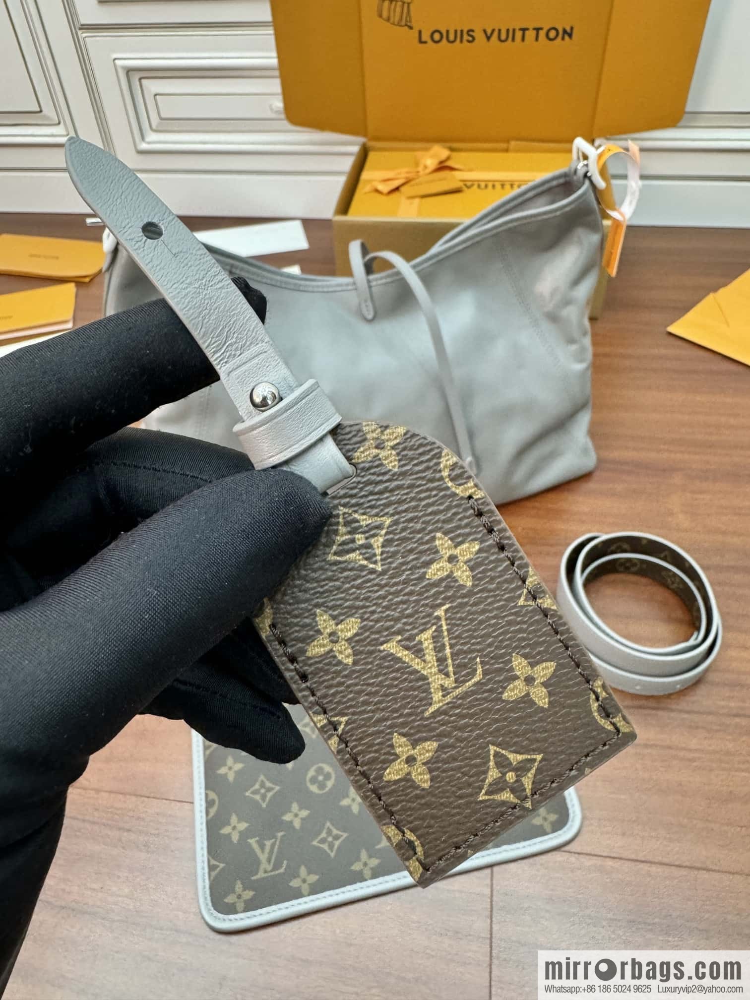 LV M12583 new CARRYALL DARK medium handbag of the season