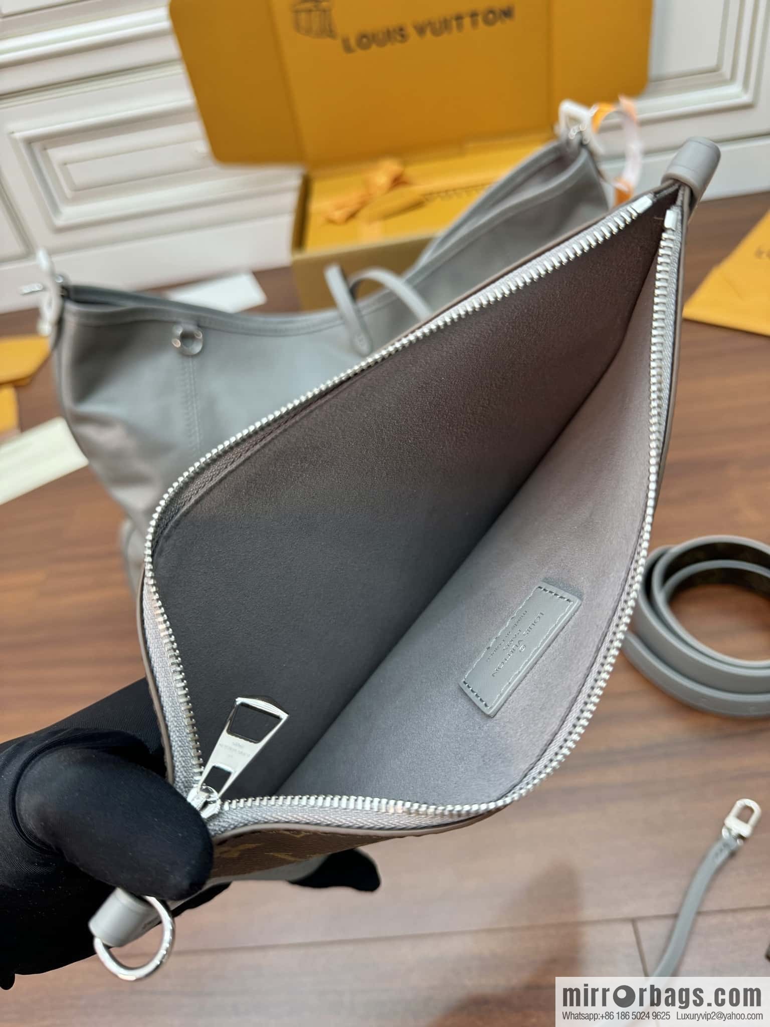 LV M12583 new CARRYALL DARK medium handbag of the season