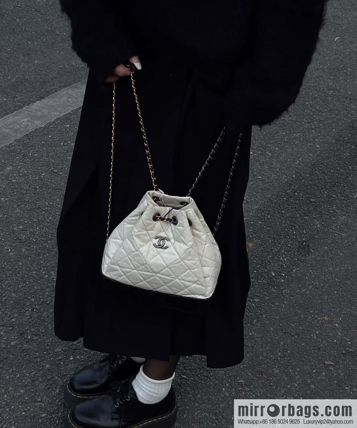 𝗖𝗵𝗮𝗻𝗲𝗹 𝗚𝗮𝗯𝗿𝗶𝗲𝗹𝗹𝗲 stray backpack, black and white 🔘 A94485