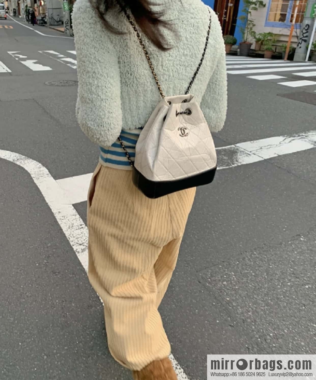 𝗖𝗵𝗮𝗻𝗲𝗹 𝗚𝗮𝗯𝗿𝗶𝗲𝗹𝗹𝗲 stray backpack, black and white 🔘 A94485