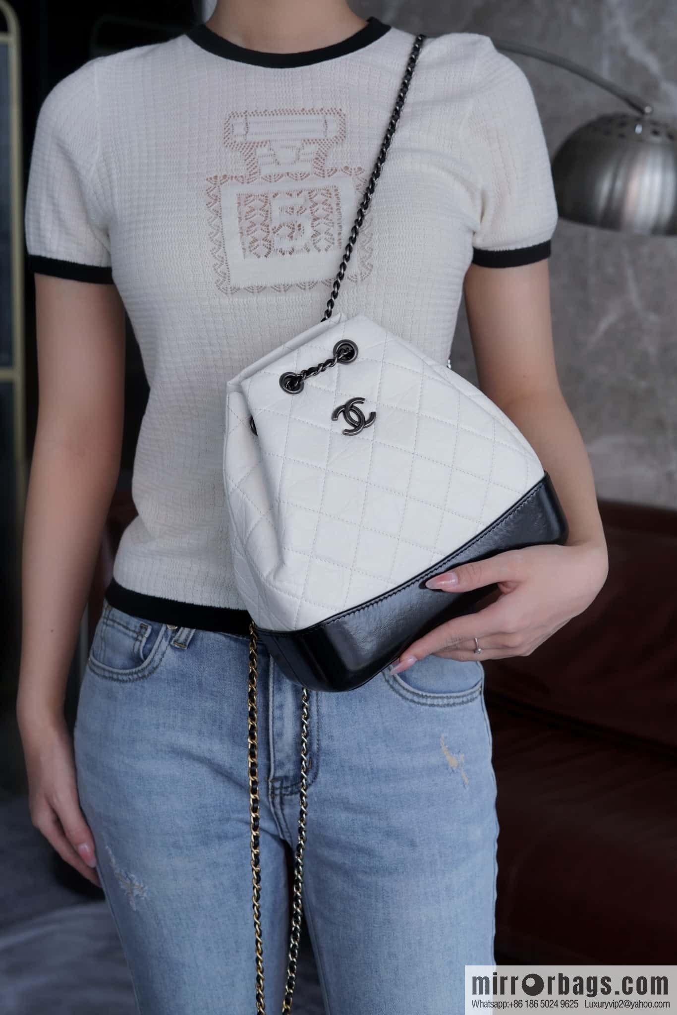 𝗖𝗵𝗮𝗻𝗲𝗹 𝗚𝗮𝗯𝗿𝗶𝗲𝗹𝗹𝗲 stray backpack, black and white 🔘 A94485