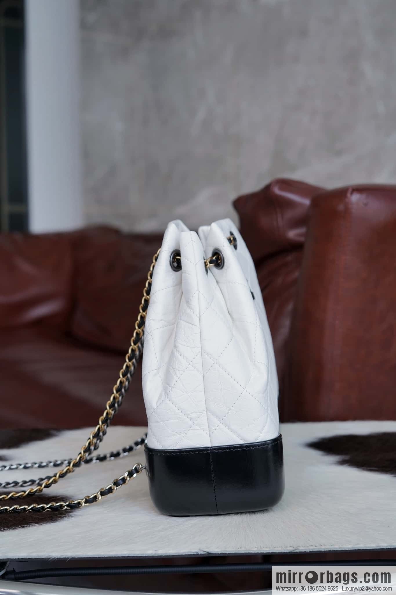𝗖𝗵𝗮𝗻𝗲𝗹 𝗚𝗮𝗯𝗿𝗶𝗲𝗹𝗹𝗲 stray backpack, black and white 🔘 A94485