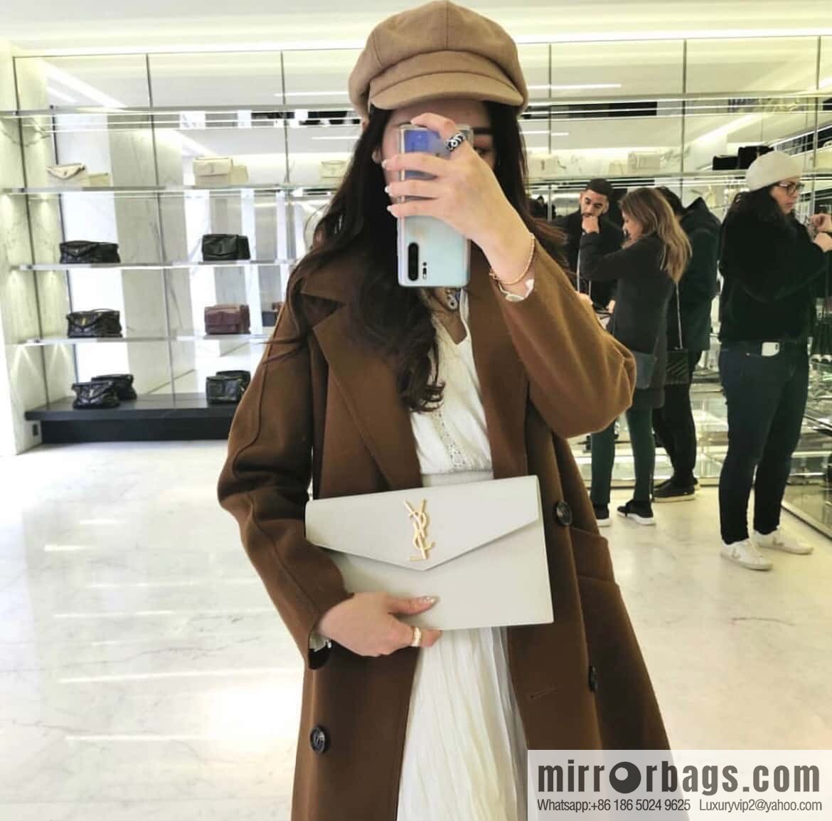 YSL 𝑼𝒑𝒕𝒐𝒘𝒏_ Caviar Clutch 565739 White