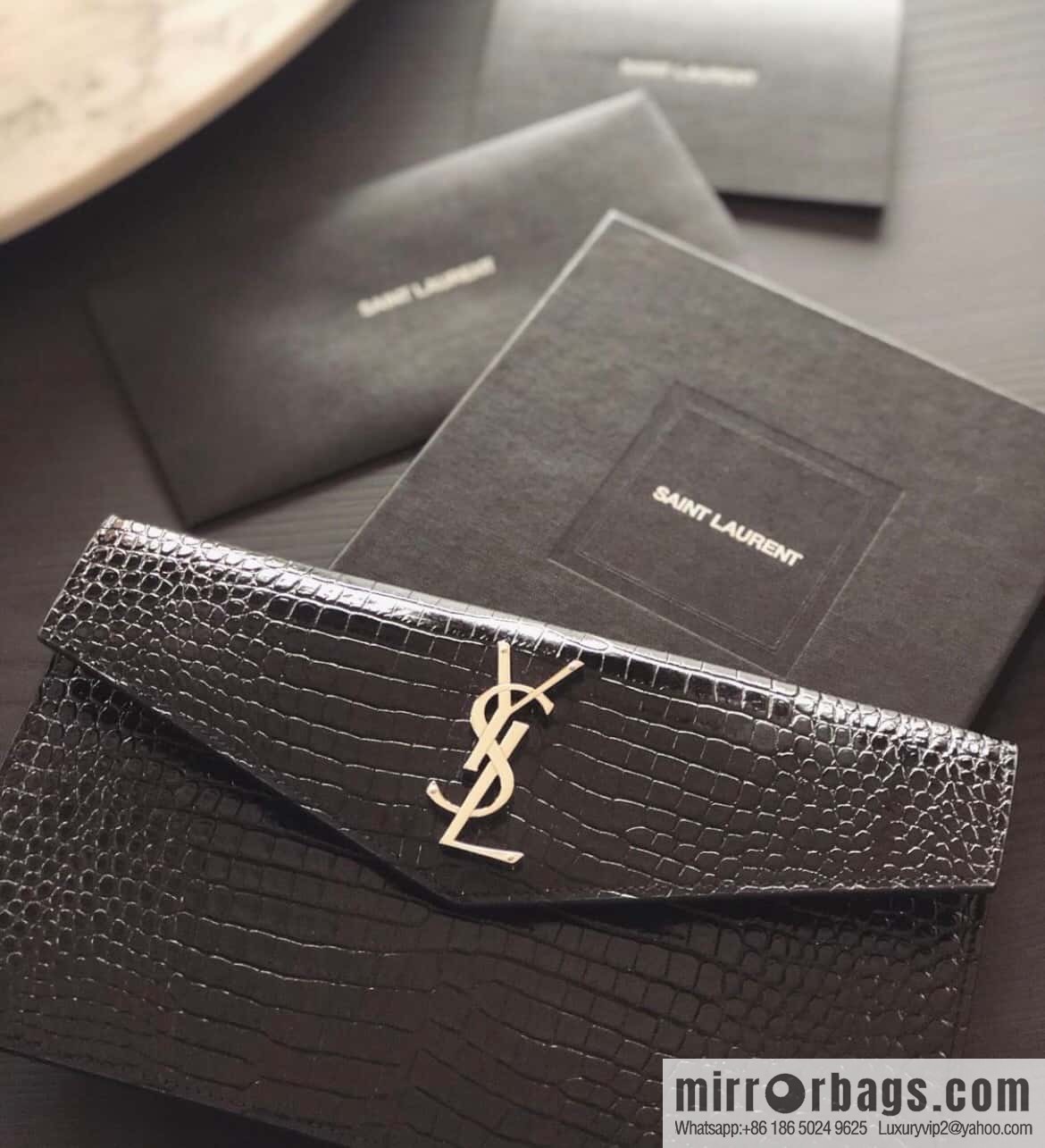 YSL 𝑼𝒑𝒕𝒐𝒘𝒏_ crocodile clutch 565739 black/silver buckle