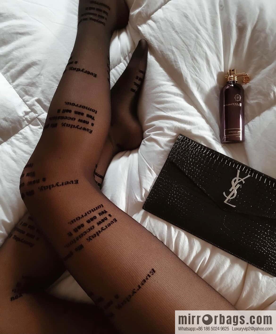 YSL 𝑼𝒑𝒕𝒐𝒘𝒏_ crocodile clutch 565739 black/silver buckle
