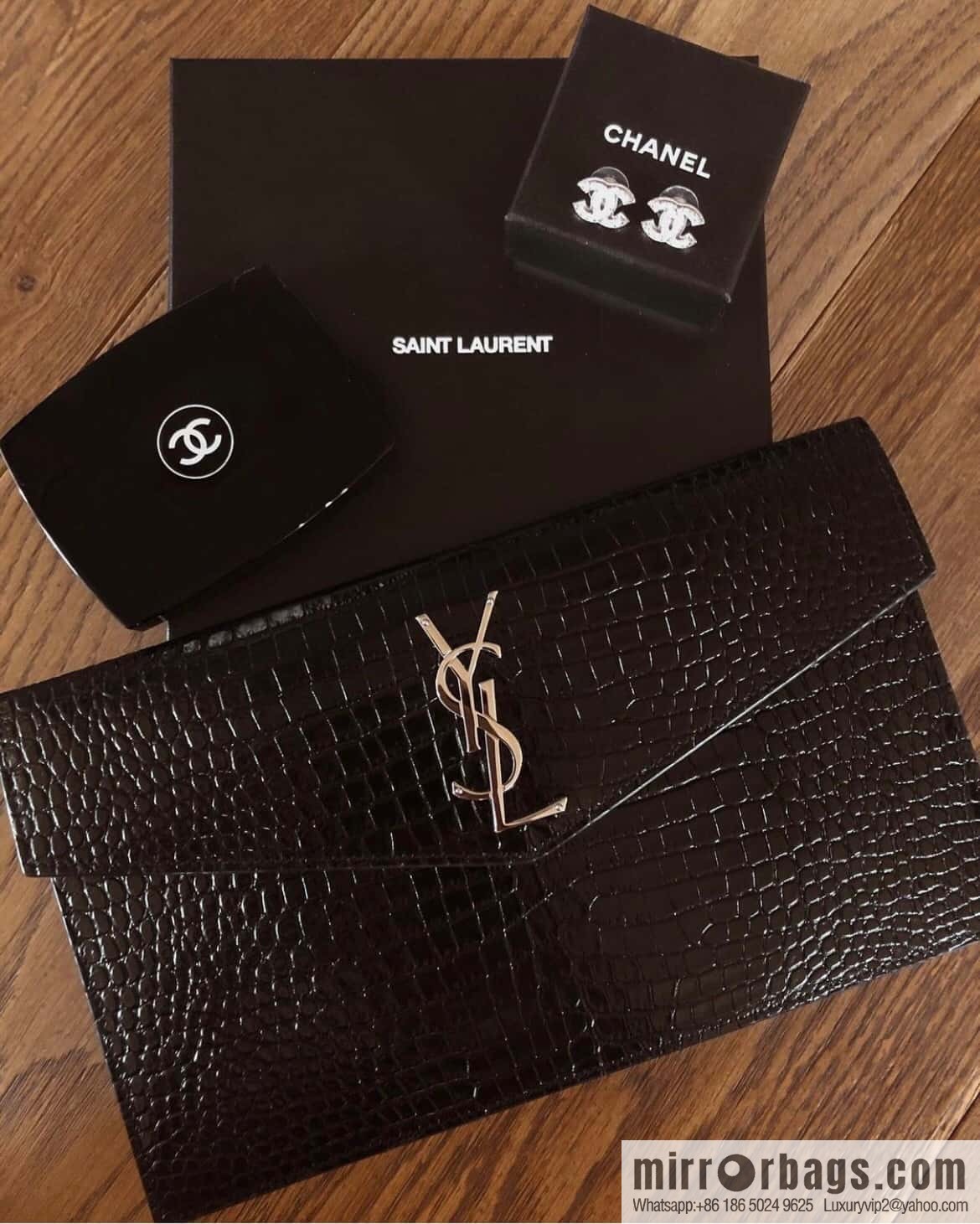 YSL 𝑼𝒑𝒕𝒐𝒘𝒏_ crocodile clutch 565739 black/silver buckle