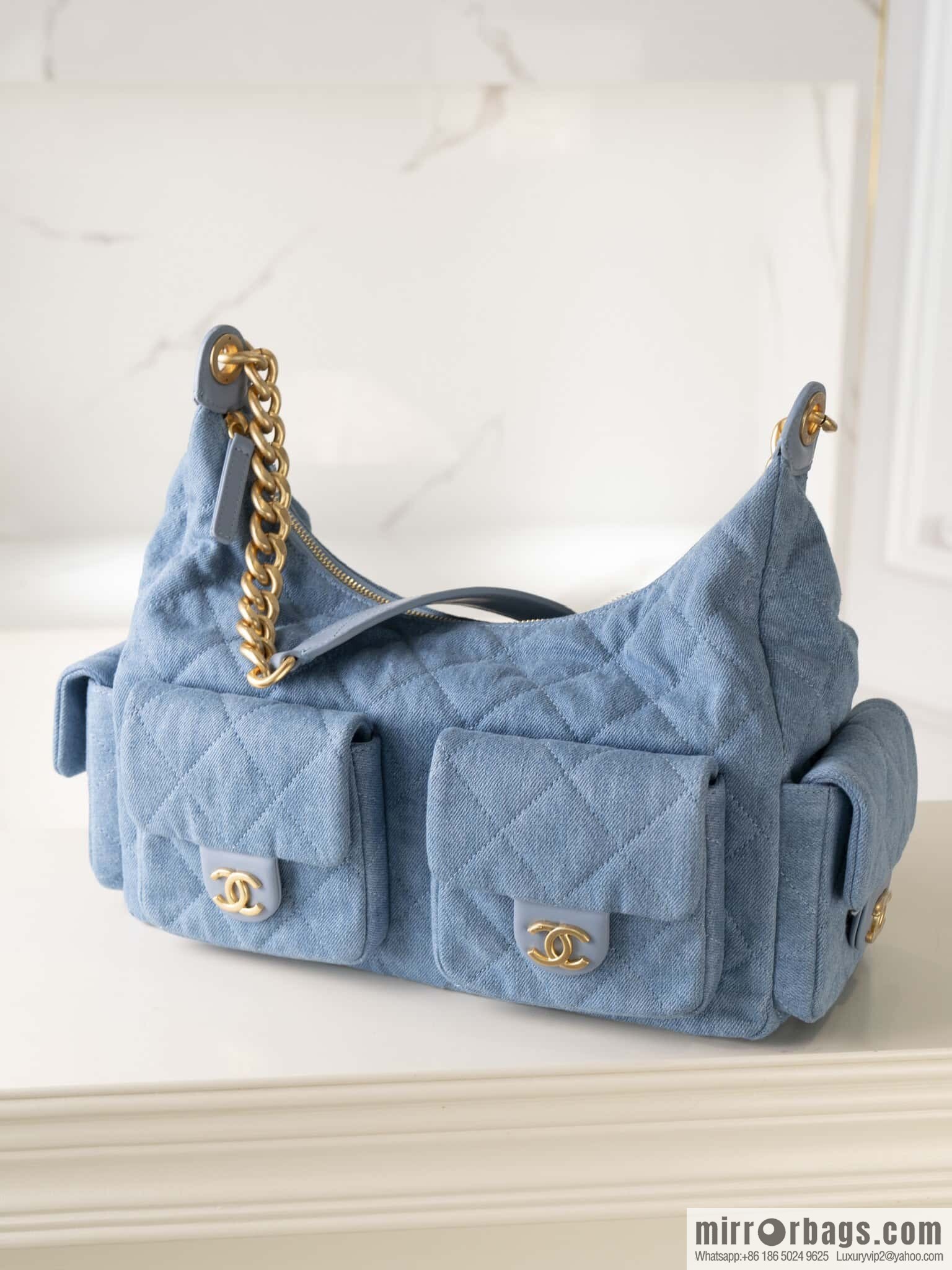 𝐂𝐡𝐚𝐧𝐞𝐥 𝟐𝟓𝐜 early spring multi pocket light denim large AS5302