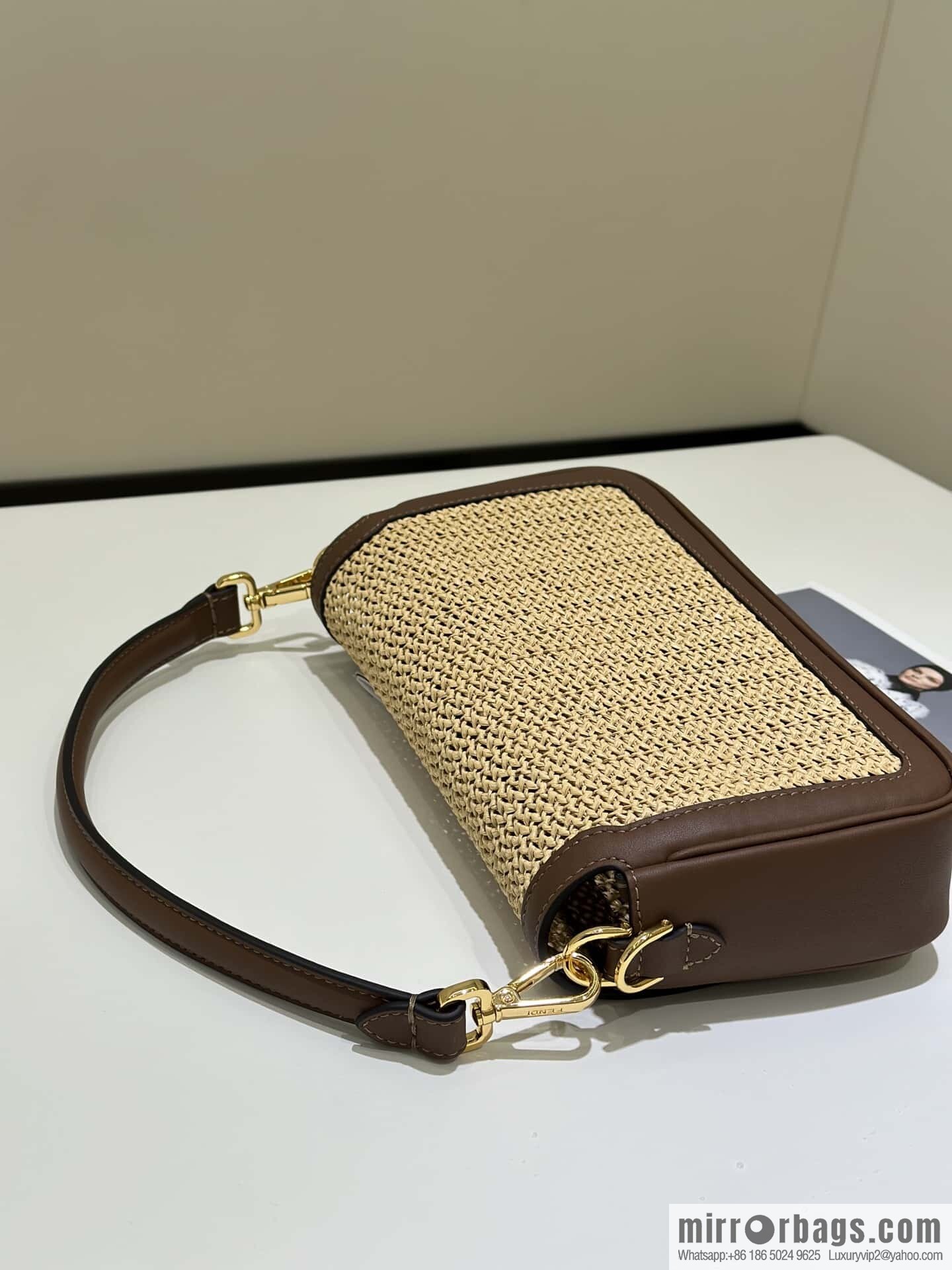 FENDI Baguette handwoven raffia handbag, model number: model number: 8666L red brown