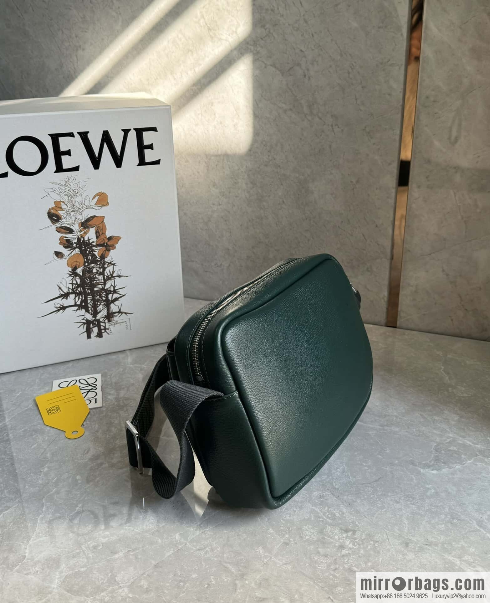 LOEWE latest | Pebble messenger bag 0522 green
