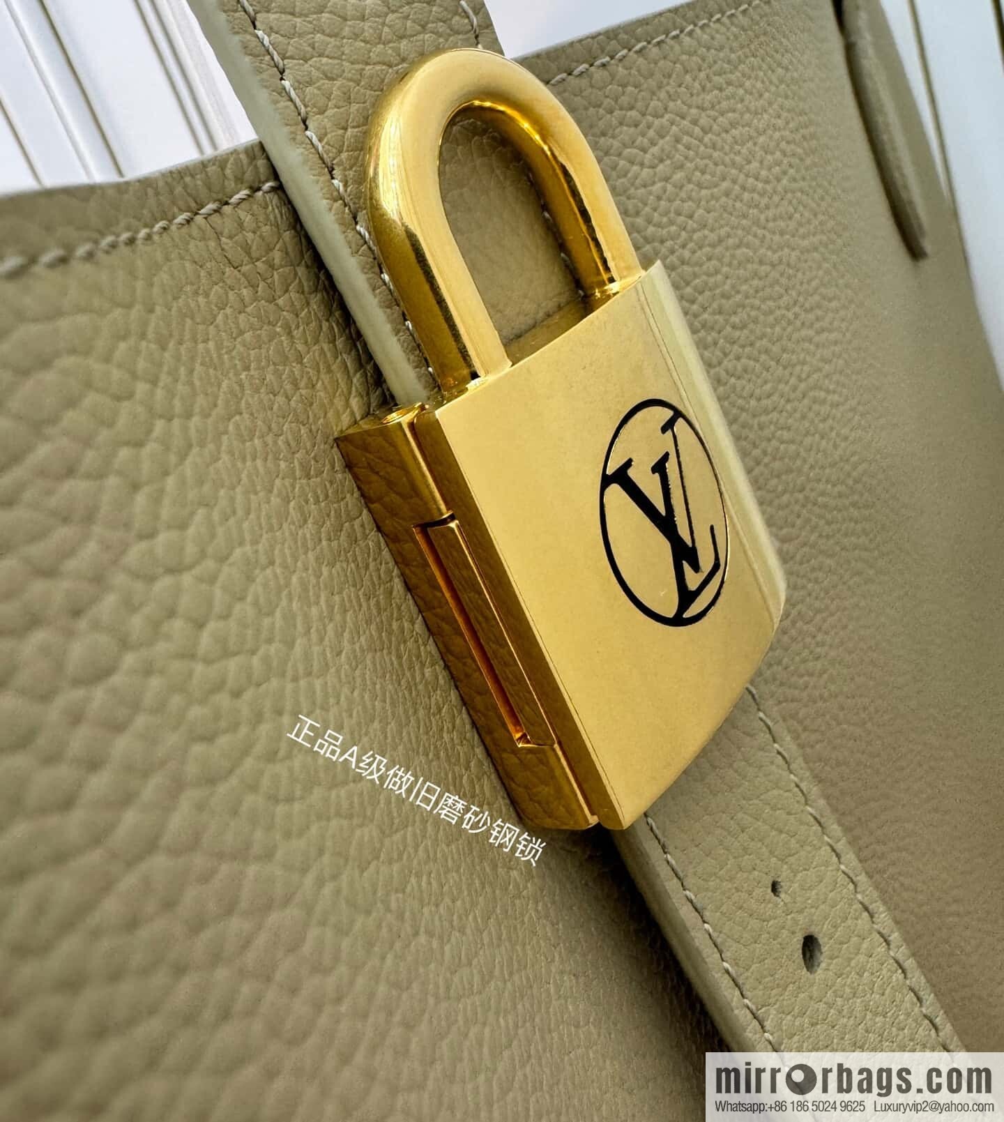 LV M25343 Low Key Cabas MM