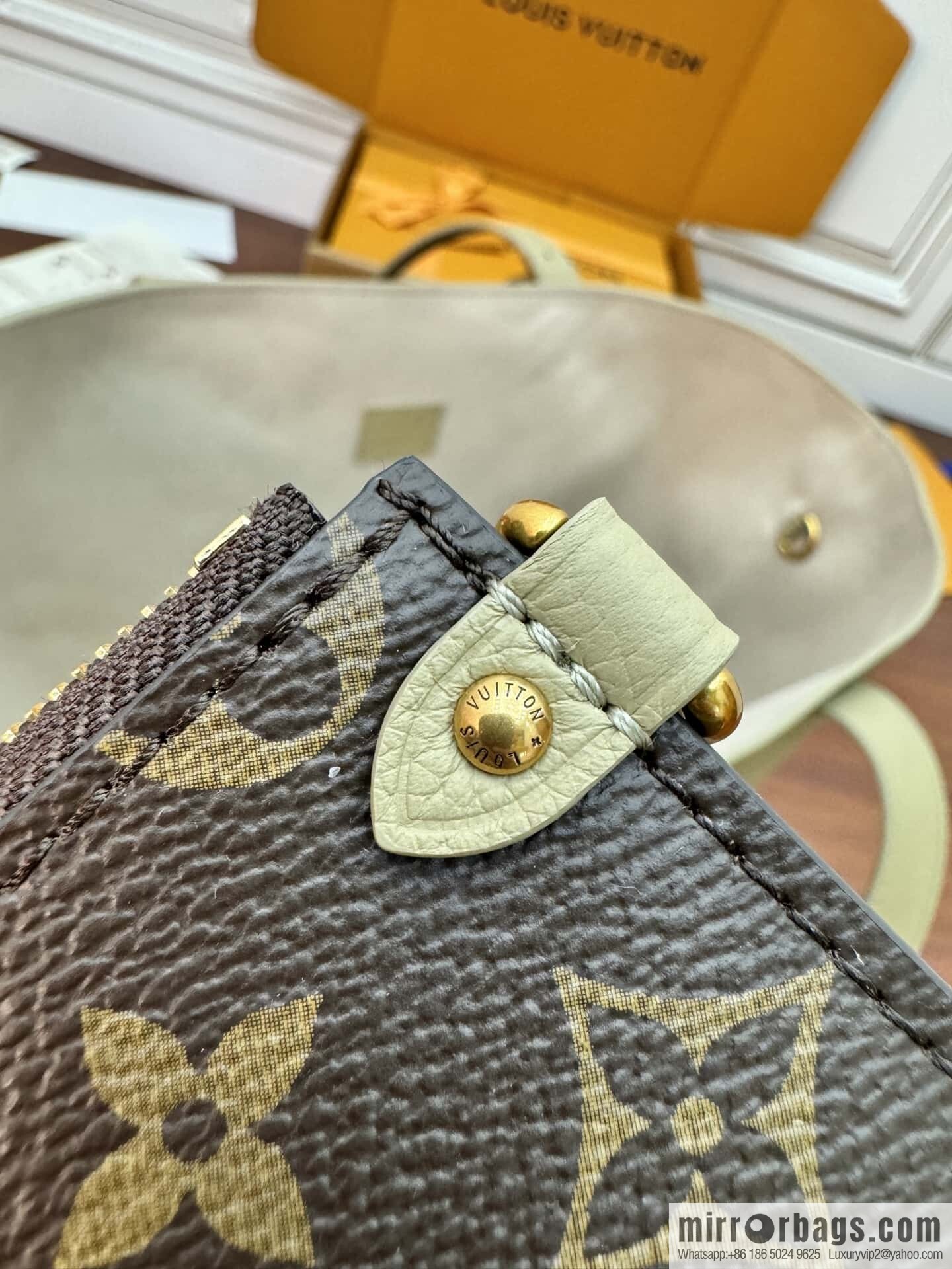 LV M25343 Low Key Cabas MM