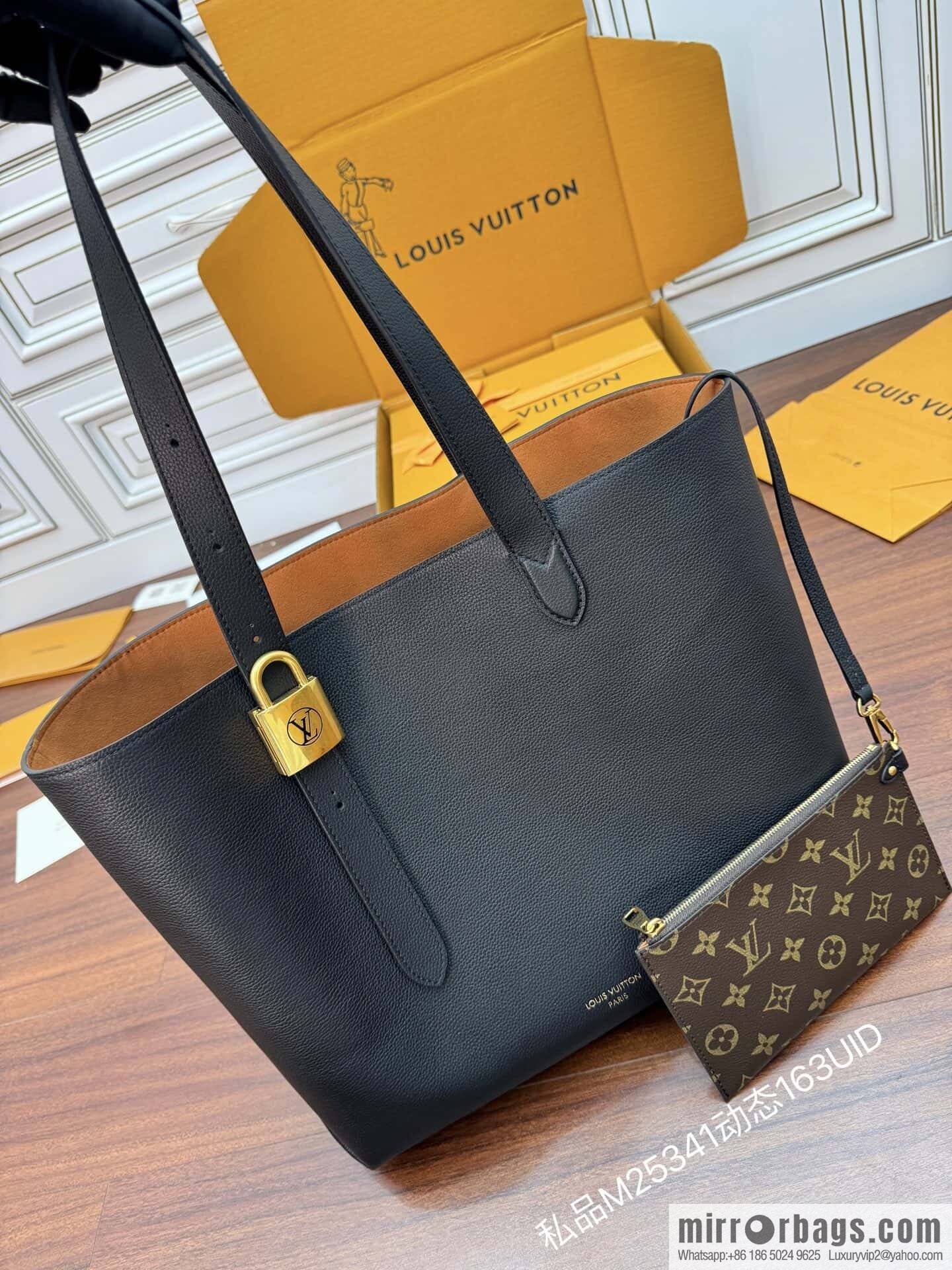 LV M25341 Low Key Cabas MM