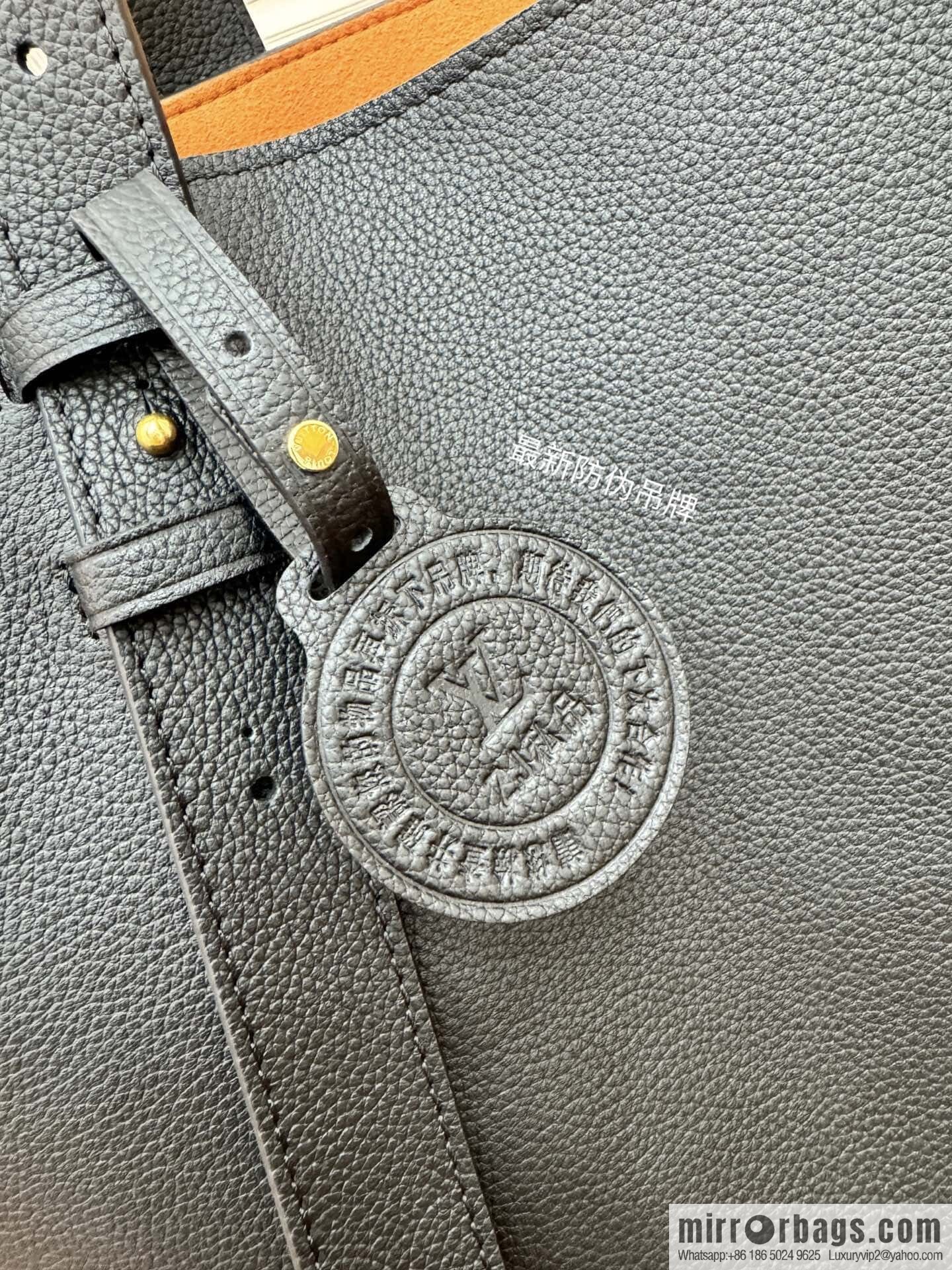 LV M25341 Low Key Cabas MM