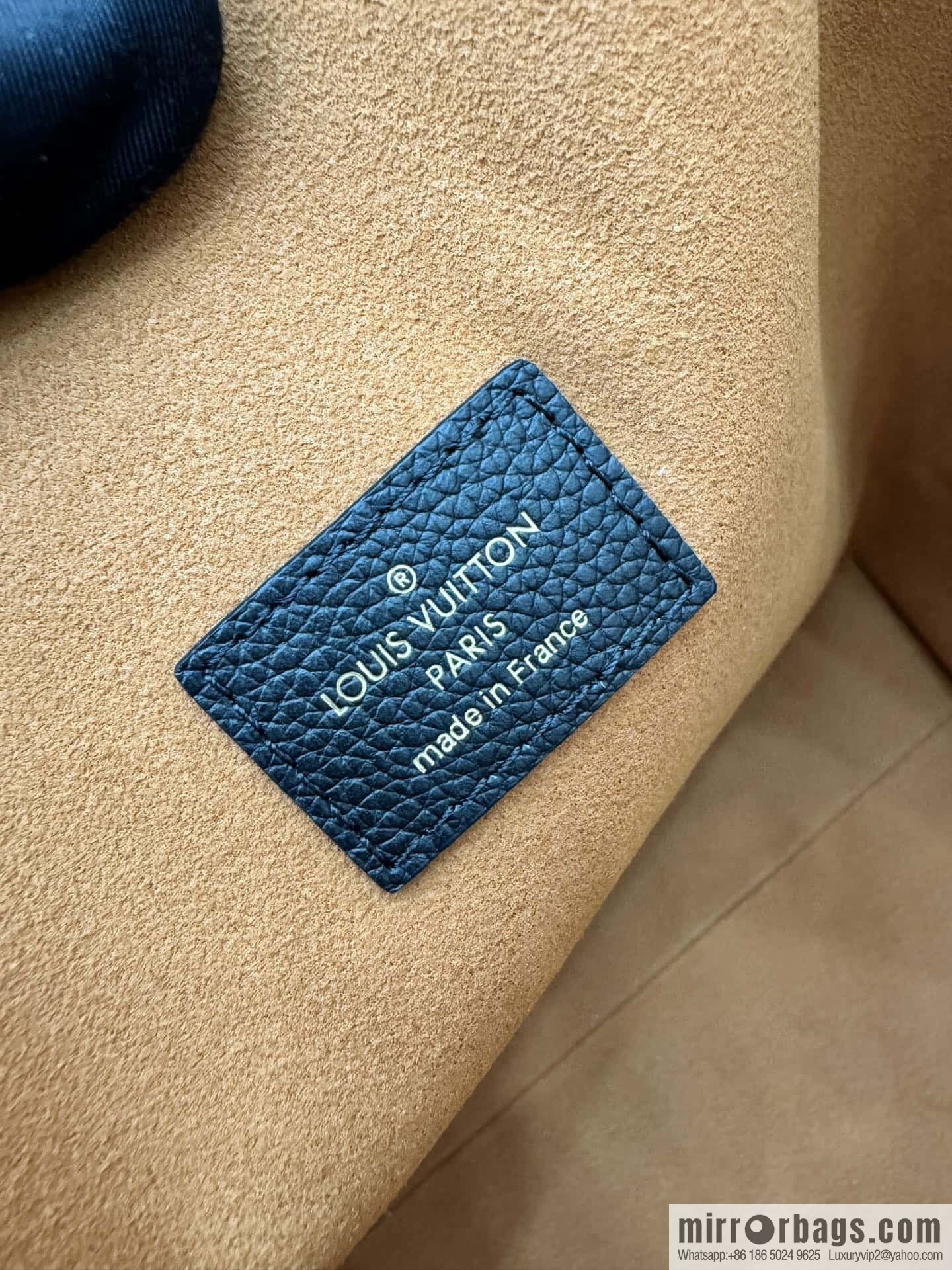 LV M25341 Low Key Cabas MM