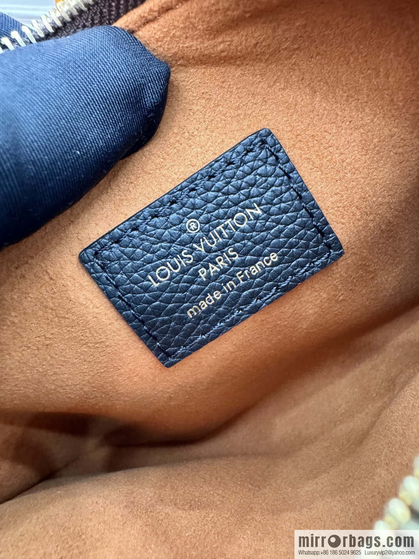 LV M25341 Low Key Cabas MM