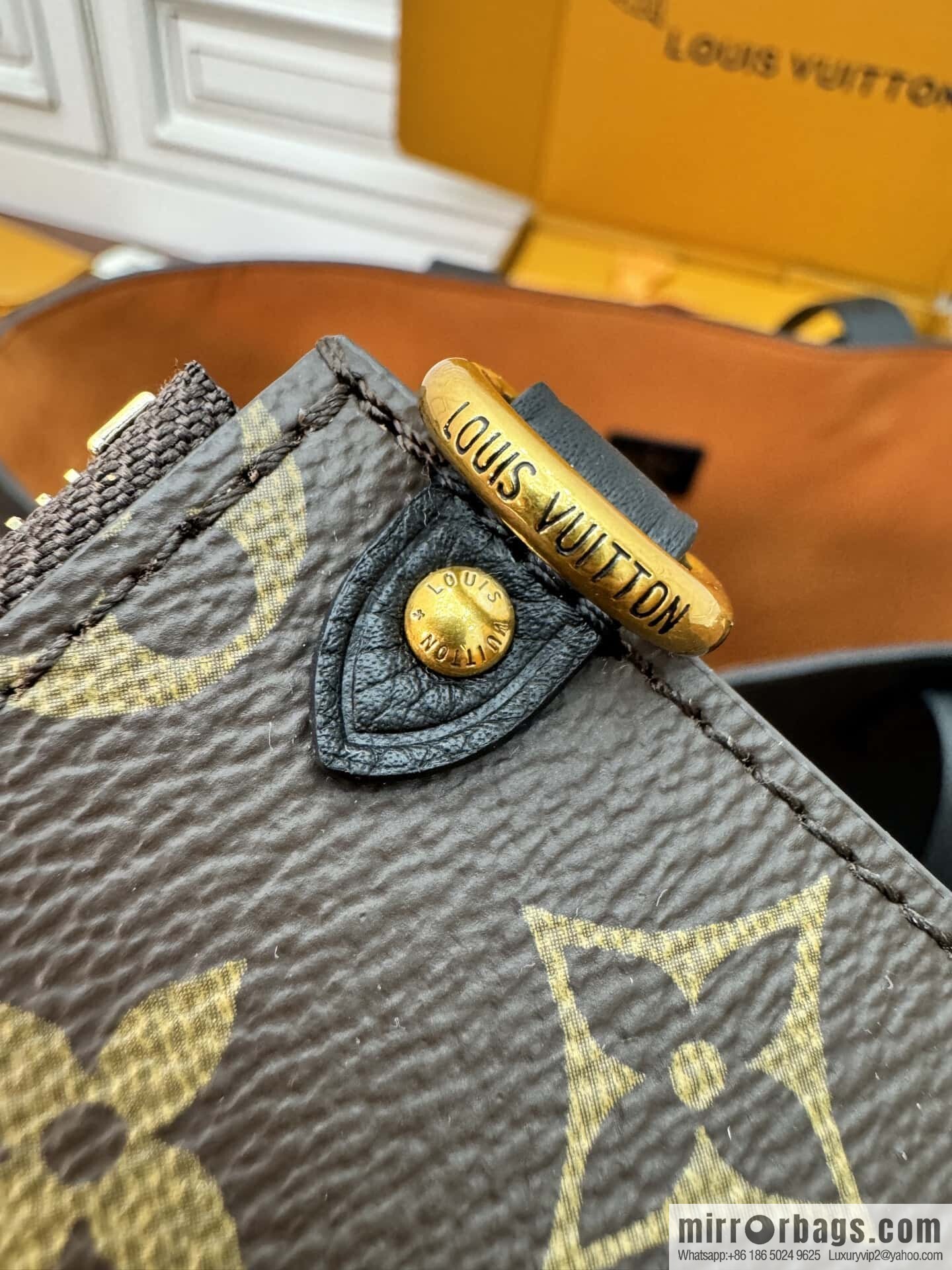 LV M25341 Low Key Cabas MM