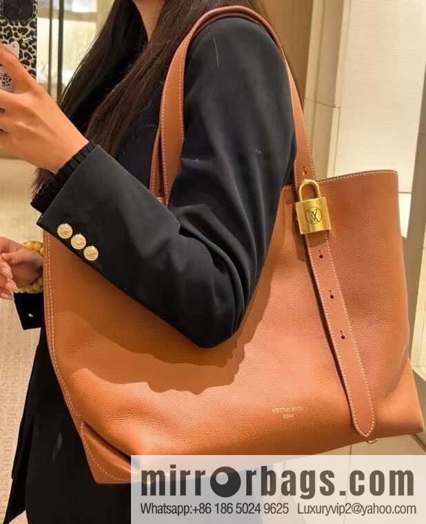 LV M25342 Low Key Cabas MM