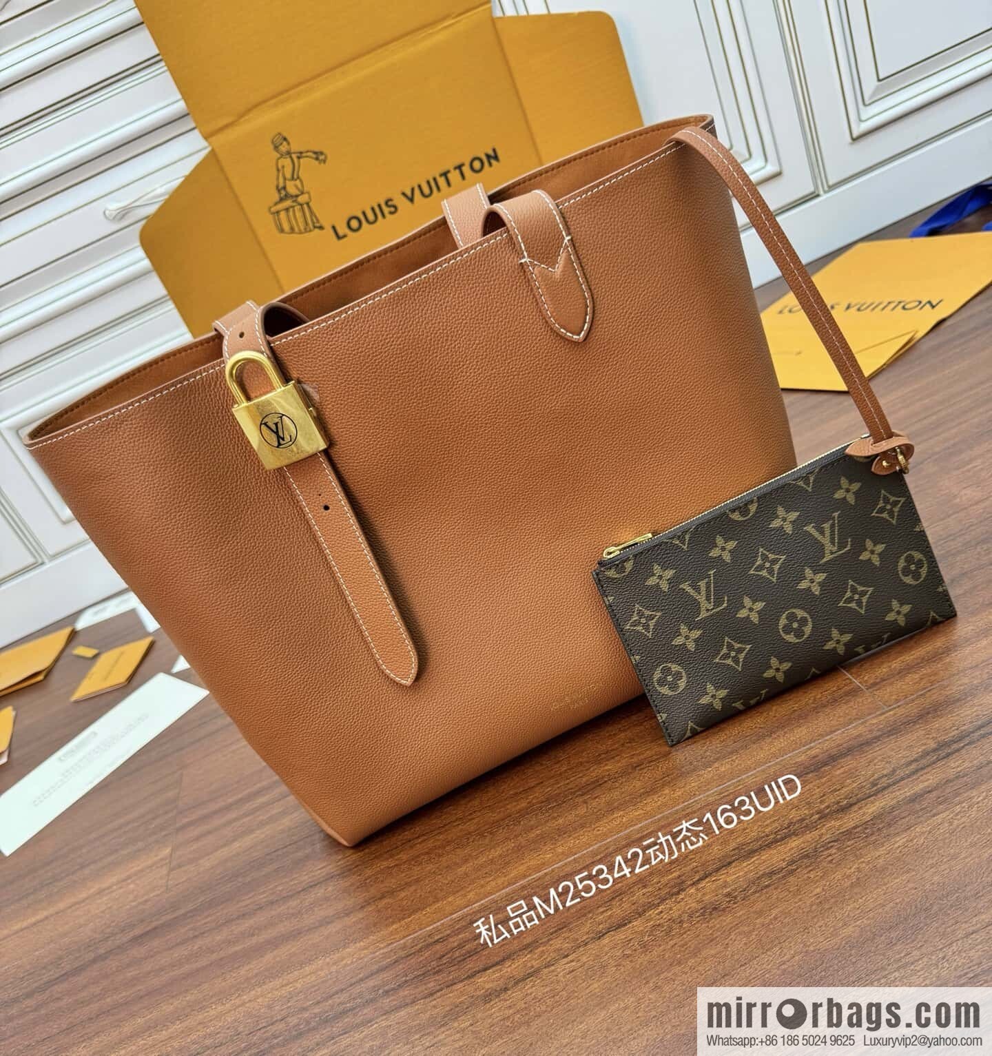 LV M25342 Low Key Cabas MM