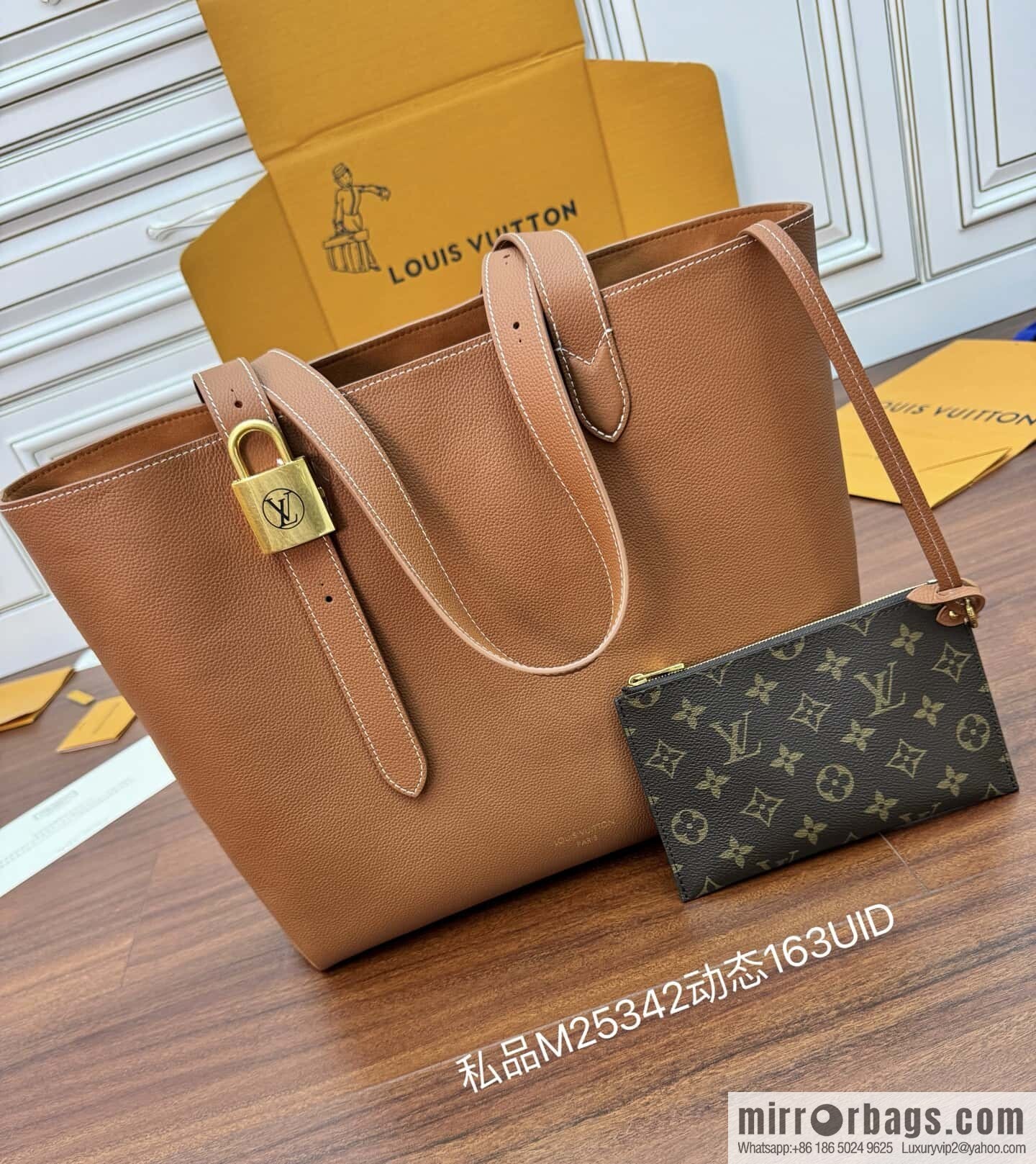 LV M25342 Low Key Cabas MM