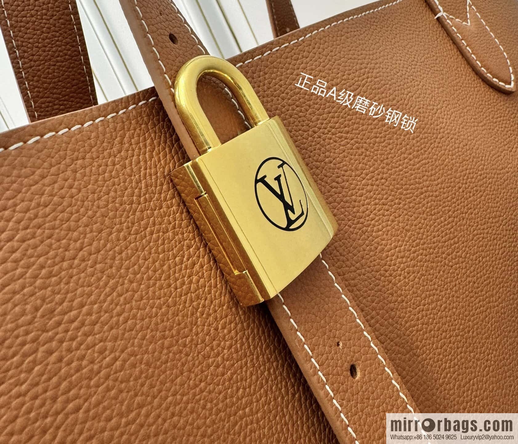LV M25342 Low Key Cabas MM