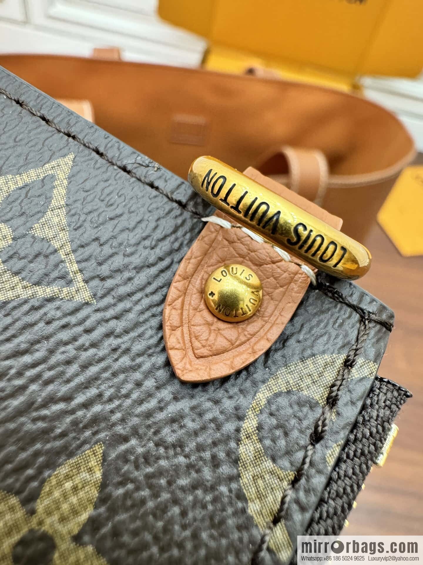 LV M25342 Low Key Cabas MM