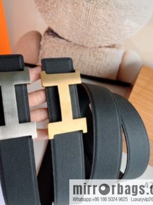 HERMES, Seiko crafted black cowhide belt with 42mm iconic elements