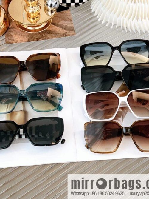 PRADA temple triangle embellished sunglasses