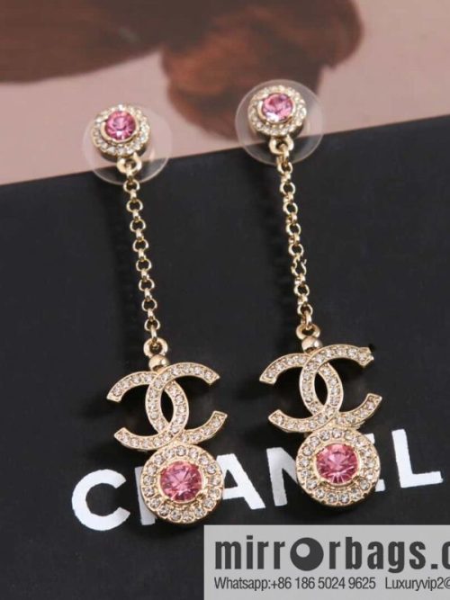 New, Chanel C2 double c round pink diamond stud earrings.
