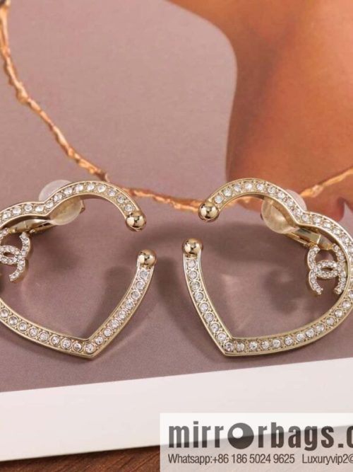 New, Chanel C1 full diamond peach heart love earclip earrings.