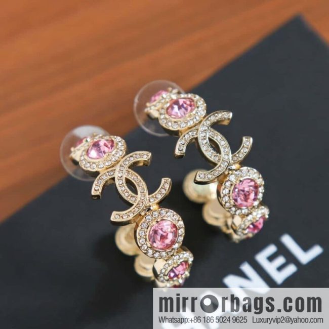 New, Chanel C1 double c semicircular pink diamond stud earrings.
