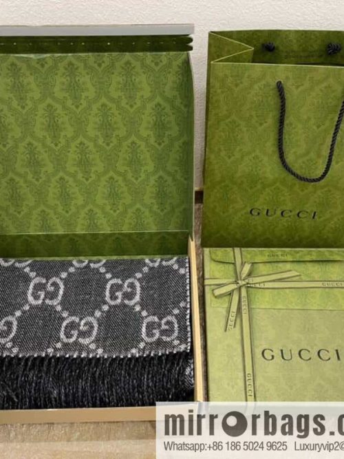 GUCCI Gucci GG pattern double-sided wool scarf 676610