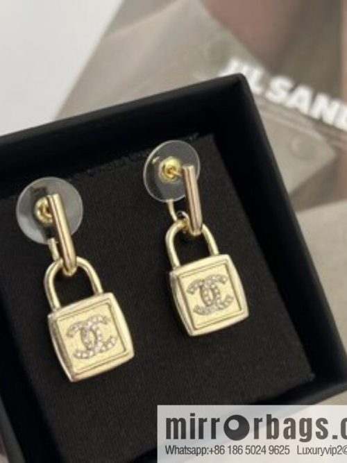 New ☑️ CHANEL Chanel gold double c lock stud earrings
