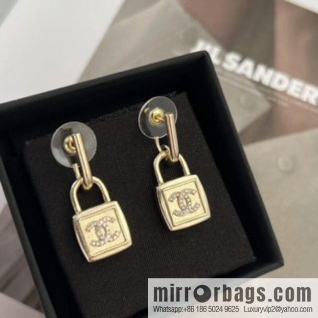 New ☑️ CHANEL Chanel gold double c lock stud earrings