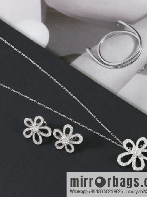 Van Cleef & Arpels Rose de Noel Diamond flower necklace earrings
