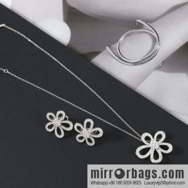 Van Cleef & Arpels Rose de Noel Diamond flower necklace earrings