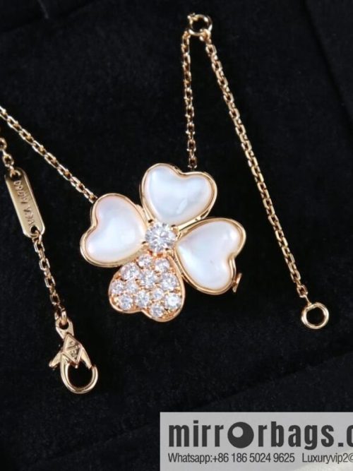 Van Cleef & Arpels cosmos four-leaf clover fritillary necklace