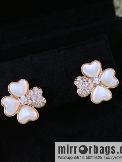 Van Cleef & Arpels cosmos four-leaf clover fritillary earshot