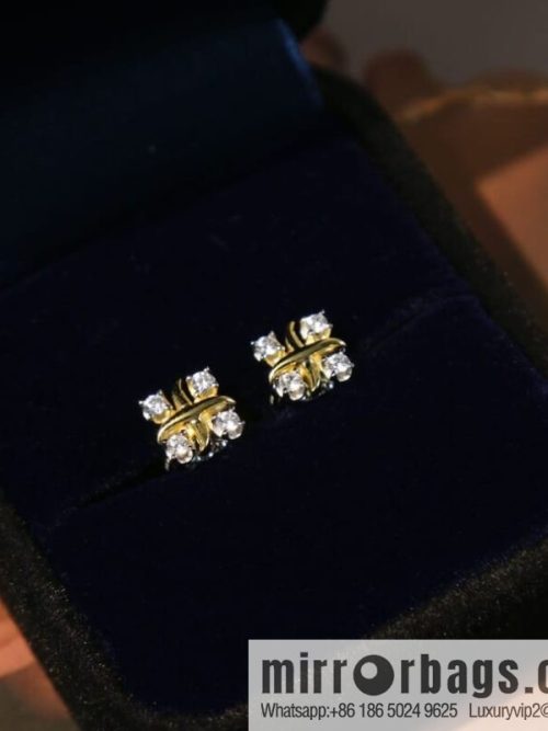 New ☑️ TIFFANY & Co. Tiffany & Co. Color separation cross stud earrings