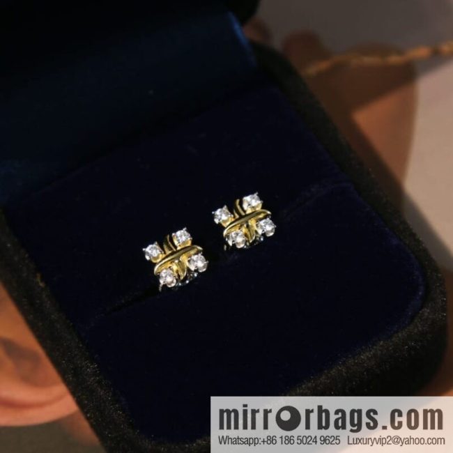 New ☑️ TIFFANY & Co. Tiffany & Co. Color separation cross stud earrings