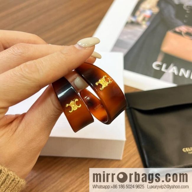 New Celine Arc de Triomphe half-bend earrings